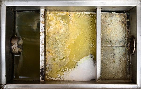 neglecting grease interceptor cleaning can cause foul odors, backed-up plumbing, and costly repairs in the kitchen